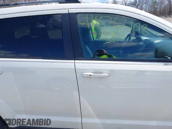 2017 Dodge Journey SXT with VIN 3C4PDCBB5HT564454, listed as a IAAI auction lot 41876498 with 198,035 mi miles and . Bid and sale history available at DreamBid. Image 14.