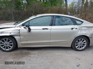 2017 Ford Fusion Hybrid SE с VIN 3FA6P0LU4HR301943, выставлен на аукционе IAAI как лот 42217709 с пробегом 102 791 миль миль и . История ставок и продаж доступна на DreamBid. Изображение 14.