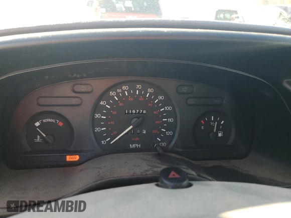 1997 Ford Contour with VIN 3FALP6535VM112253, listed as a Copart auction lot 80501924 with 116,778 mi miles and Salvage title. Bid and sale history available at DreamBid. Image 9.