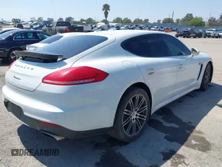 2015 Porsche Panamera 4 z VIN WP0AA2A72FL005751, wystawiony jako IAAI lot #37747010 z przebiegiem 68 128 mil mil oraz . Historia ofert i sprzedaży dostępna na DreamBid. Obrazek 4.