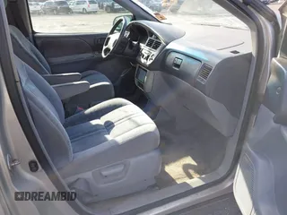 2002 Toyota Sienna LE with VIN 4T3ZF13C52U450825, listed as a IAAI auction lot 41604636 with 179,495 mi miles. Bid and sale history available at carsss.com. Image 5.