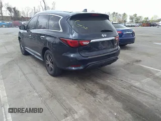2016 Infiniti QX60 with VIN 5N1AL0MM0GC506599, listed as a IAAI auction lot 41921886 with 113,821 mi miles. Bid and sale history available at carsss.com. Image 3.