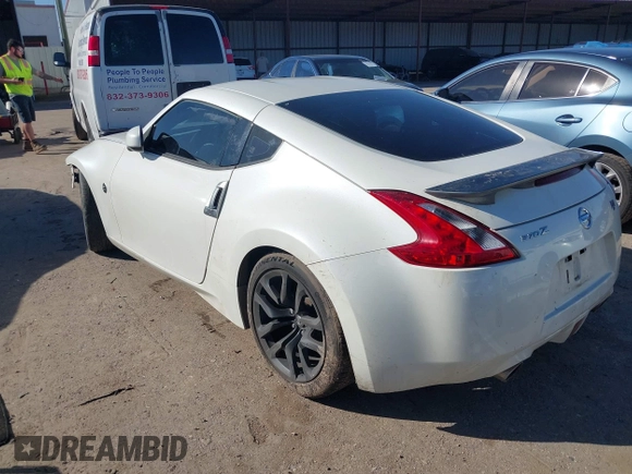 2017 Nissan 370Z with VIN JN1AZ4EH2HM953493, listed as a IAAI auction lot 41228710 with 82,114 mi miles. Bid and sale history available at carsss.com. Image 3.