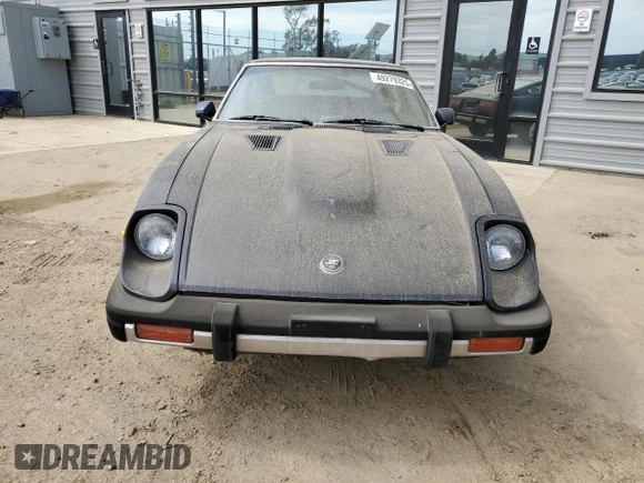 1981 Datsun 280ZX z VIN JN1HZ04S8BX265704, wystawiony jako Copart lot #49279325 z przebiegiem 251 218 mil mil oraz Tytuł czysty. Historia ofert i sprzedaży dostępna na DreamBid. Obrazek 5.