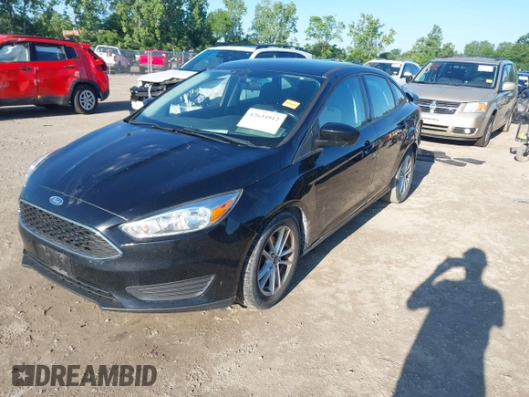 2018 Ford Focus SE with VIN 1FADP3FEXJL286396, listed as a IAAI auction lot 42634912 with 73,769 mi miles and . Bid and sale history available at DreamBid. Image 17.