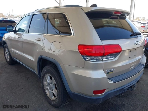 2014 Jeep Grand Cherokee Laredo with VIN 1C4RJFAG7EC380544, listed as a IAAI auction lot 42021130 with 166,589 mi miles. Bid and sale history available at carsss.com. Image 3.