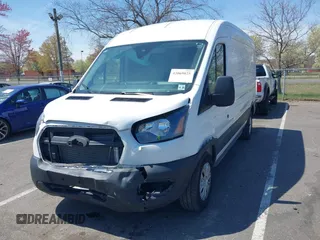 2024 Ford Transit Cargo z VIN 1FTBR1C84RKA39388, wystawiony jako IAAI lot #42069825 z przebiegiem 20 851 mil mil oraz . Historia ofert i sprzedaży dostępna na DreamBid. Obrazek 17.