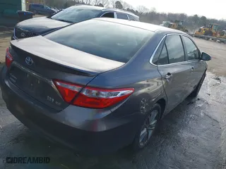 2015 Toyota Camry Hybrid LE with VIN 4T1BD1FK5FU164384, listed as a IAAI auction lot 41704922 with 122,132 mi miles. Bid and sale history available at carsss.com. Image 4.