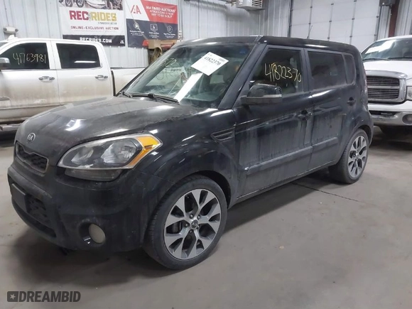 2013 Kia Soul + with VIN KNDJT2A62D7751897, listed as a IAAI auction lot 41822370 with 164,563 mi miles. Bid and sale history available at carsss.com. Image 2.