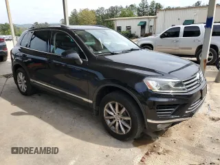 2016 Volkswagen Touareg Sport with VIN WVGEF9BP3GD007543, listed as a Copart auction lot 52806715 with 121,404 mi miles and Salvage Title. Bid and sale history available at DreamBid. Image 4.