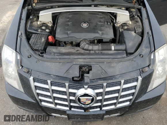 2012 Cadillac CTS with VIN 1G6DC1E37C0133766, listed as a Copart auction lot 71578164 with 131,246 mi miles and Salvage title. Bid and sale history available at DreamBid. Image 11.