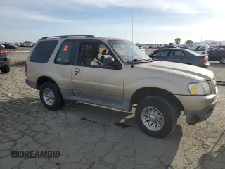 2001 Ford Explorer Sport with VIN 1FMYU60E01UA19935, listed as a Copart auction lot 49678955 with 90,090 mi miles and Salvage title. Bid and sale history available at DreamBid. Image 4.