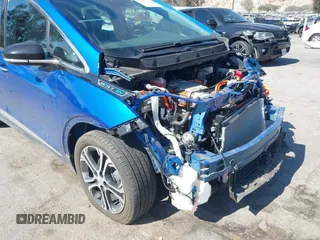 2020 Chevrolet Bolt EV Premier with VIN 1G1FZ6S04L4125895, listed as a IAAI auction lot 41637004 with 18,548 mi miles and . Bid and sale history available at DreamBid. Image 21.