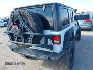 2018 Jeep Wrangler Unlimited Sport S с VIN 1C4HJXDG0JW205803, выставлен на аукционе IAAI как лот 41615097 с пробегом Не указан миль и . История ставок и продаж доступна на DreamBid. Изображение 4.