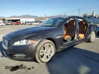 2013 Jaguar XJ with VIN SAJWA2GB0DLV43865, listed as a Copart auction lot 79693934 with 0 mi miles and Salvage Title. Bid and sale history available at carsss.com. Image 1.