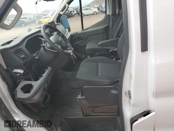 2021 Ford Transit Cargo with VIN 1FTYE1Y86MKB00604, listed as a Copart auction lot 69333594 with 60,464 mi miles and Salvage Title. Bid and sale history available at carsss.com. Image 7.
