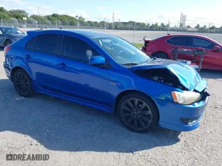 2010 Mitsubishi Lancer GTS with VIN JA32X8HW4AU004864, listed as a IAAI auction lot 41506558 with 141,514 mi miles. Bid and sale history available at carsss.com. Image 1.