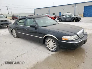 2004 Lincoln Town Car Ultimate z VIN 1LNHM83W14Y660640, wystawiony jako Copart lot #53652685 z przebiegiem 147 781 mil mil oraz Czysty tytuł • Clean title. Historia ofert i sprzedaży dostępna na DreamBid. Obrazek 4.