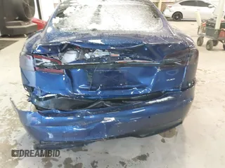 2021 Tesla Model S Plaid with VIN 5YJSA1E6XMF439884, listed as a IAAI auction lot 41622750 with Not provided miles and . Bid and sale history available at DreamBid. Image 6.