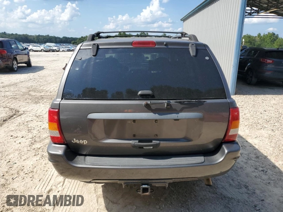 2002 Jeep Grand Cherokee with VIN 1J8GX48S12C255290, listed as a Copart auction lot 57832025 with 191,293 mi miles and Non repairable. Bid and sale history available at DreamBid. Image 6.