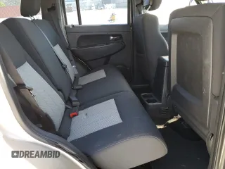 2010 Jeep Liberty Sport with VIN 1J4PP2GK9AW128825, listed as a Copart auction lot 48113835 with 258,730 mi miles and Salvage Title. Bid and sale history available at DreamBid. Image 11.