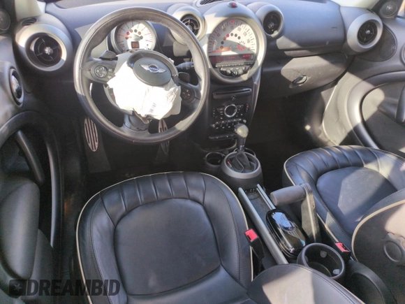 2012 MINI Countryman S with VIN WMWZC3C57CWL80976, listed as a Copart auction lot 50023105 with 74,504 mi miles and Salvage Title. Bid and sale history available at DreamBid. Image 8.