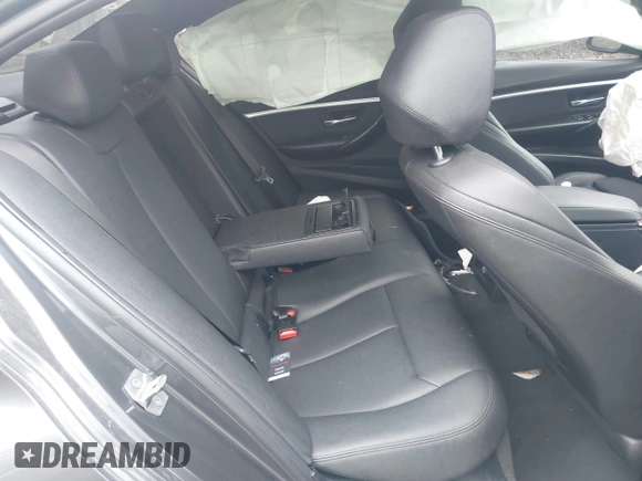 2018 BMW 3 Series with VIN WBA8F1C54JAE93207, listed as a IAAI auction lot 41876781 with 64,749 mi miles and . Bid and sale history available at DreamBid. Image 8.