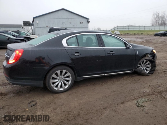 2015 Lincoln MKS with VIN 1LNHL9DK7FG606935, listed as a Copart auction lot 81991384 with 82,097 mi miles and Salvage Title. Bid and sale history available at carsss.com. Image 3.