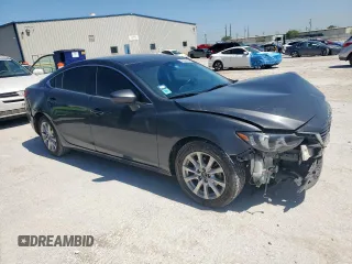 2016 Mazda 6 i Sport with VIN JM1GJ1U59G1458082, listed as a Copart auction lot 52247085 with 148,029 mi miles and Salvage Title. Bid and sale history available at DreamBid. Image 4.