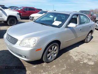 2007 Kia Optima EX with VIN KNAGE124975157963, listed as a IAAI auction lot 41673886 with 128,278 mi miles. Bid and sale history available at carsss.com. Image 2.