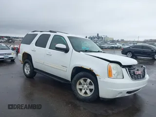 2011 GMC Yukon SLT z VIN 1GKS2CE03BR118690, wystawiony jako IAAI lot #41941840 z przebiegiem 243 311 mil mil oraz . Historia ofert i sprzedaży dostępna na DreamBid. Obrazek 1.