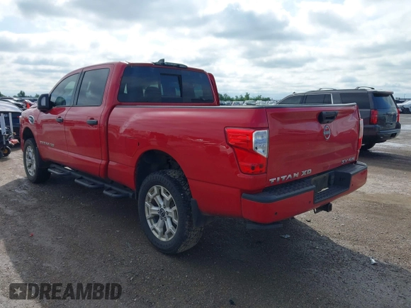 2023 Nissan Titan Pro-4X with VIN 1N6AA1FB9PN104089, listed as a IAAI auction lot 42202488 with 58,151 mi miles and . Bid and sale history available at DreamBid. Image 3.