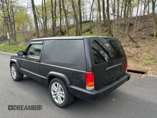 1997 Jeep Cherokee with VIN 1J4FT67S6VL571732, listed as a Copart auction lot 56349005 with 153,146 mi miles and Clean title. Bid and sale history available at DreamBid. Image 3.