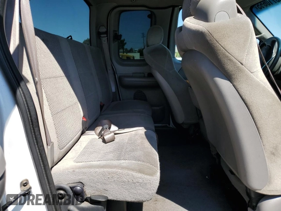 2002 Ford F-150 XL with VIN 1FTRX17212NA28461, listed as a Copart auction lot 63710665 with 185,460 mi miles and Salvage title. Bid and sale history available at DreamBid. Image 10.