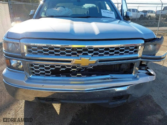 2015 Chevrolet Silverado 1500 LT with VIN 1GCVKREH8FZ304121, listed as a IAAI auction lot 41590466 with 165,448 mi miles. Bid and sale history available at carsss.com. Image 6.