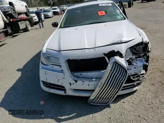 2014 Chrysler 300 with VIN 2C3CCAEG5EH375311, listed as a Copart auction lot 48773995 with 197,547 mi miles and Salvage Title. Bid and sale history available at carsss.com. Image 11.