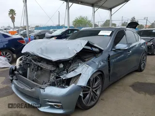 2015 Infiniti Q50 Premium with VIN JN1BV7AP1FM351633, listed as a IAAI auction lot 41880366 with 106,564 mi miles. Bid and sale history available at carsss.com. Image 2.
