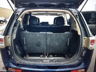 2014 Mitsubishi Outlander SE with VIN JA4AZ3A37EZ008288, listed as a IAAI auction lot 41928257 with 96,779 mi miles. Bid and sale history available at carsss.com. Image 12.