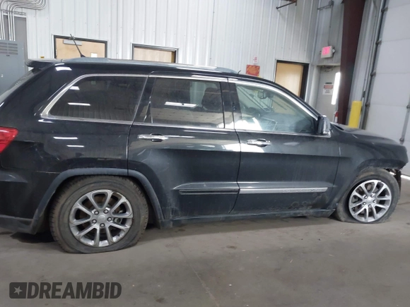 2013 Jeep Grand Cherokee Overland with VIN 1C4RJFCT7DC524005, listed as a IAAI auction lot 42116097 with 126,942 mi miles. Bid and sale history available at carsss.com. Image 13.