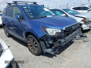 2018 Subaru Forester Touring with VIN JF2SJGWC8JH414373, listed as a IAAI auction lot 41718823 with 22,552 mi miles. Bid and sale history available at carsss.com. Image 1.