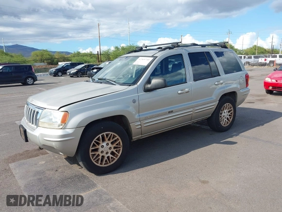 2004 Jeep Grand Cherokee Limited with VIN 1J4GW58N54C299669, listed as a IAAI auction lot 42369745 with 90,240 mi miles and . Bid and sale history available at DreamBid. Image 2.