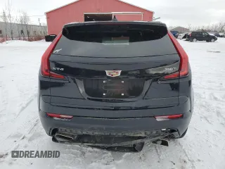 2022 Cadillac XT4 FWD Luxury z VIN 1GYAZAR48NF163967, wystawiony jako Copart lot #43148925 z przebiegiem 58 788 mil mil oraz Czysty tytuł • Clean title. Historia ofert i sprzedaży dostępna na DreamBid. Obrazek 6.
