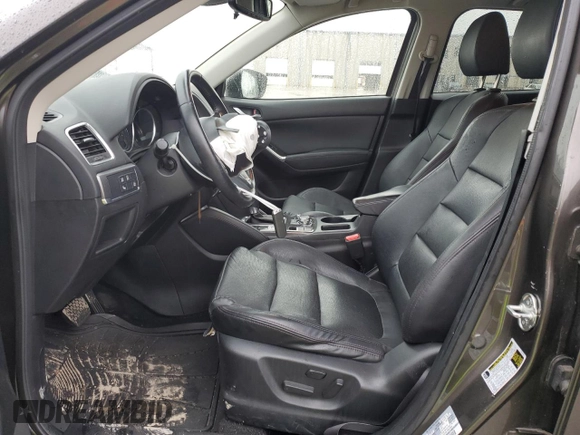 2016 Mazda CX-5 Grand Touring with VIN JM3KE2DY4G0811386, listed as a Copart auction lot 51961795 with 99,525 mi miles and Salvage Title. Bid and sale history available at carsss.com. Image 7.