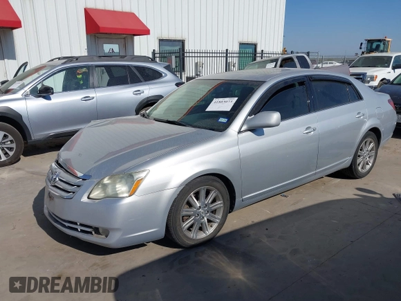 2007 Toyota Avalon XL with VIN 4T1BK36B97U179702, listed as a IAAI auction lot 41803073 with 162,376 mi miles. Bid and sale history available at carsss.com. Image 2.