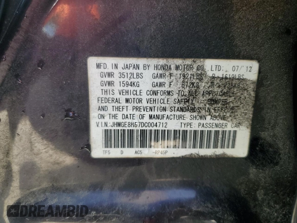 2013 Honda Fit Sport with VIN JHMGE8H57DC004712, listed as a Copart auction lot 51426885 with 203,217 mi miles and Salvage Title. Bid and sale history available at carsss.com. Image 12.