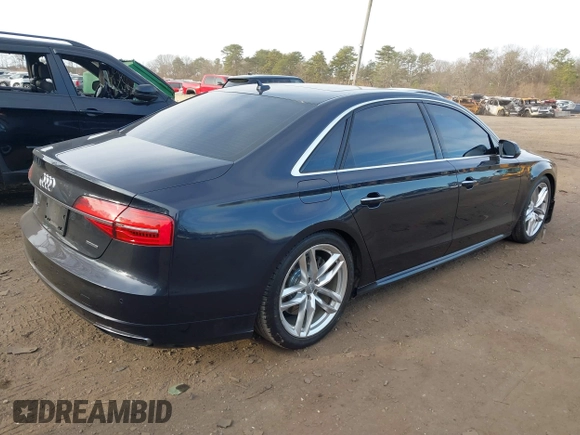 2017 Audi A8 L with VIN WAU44AFDXHN006857, listed as a IAAI auction lot 41758062 with 88,385 mi miles. Bid and sale history available at carsss.com. Image 4.