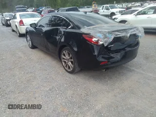 2015 Mazda 6 i Grand Touring with VIN JM1GJ1W68F1168078, listed as a IAAI auction lot 42149519 with 127,641 mi miles and . Bid and sale history available at DreamBid. Image 3.