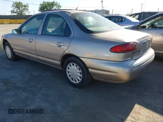 1995 Ford Contour LX z VIN 1FALP6536SK194464, wystawiony jako IAAI lot #42305265 z przebiegiem 217 353 mil mil oraz . Historia ofert i sprzedaży dostępna na DreamBid. Obrazek 3.