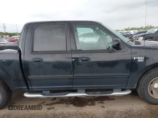 2003 Ford F-150 XLT with VIN 1FTRW07623KD67409, listed as a IAAI auction lot 41912067 with Not Provided miles. Bid and sale history available at carsss.com. Image 13.
