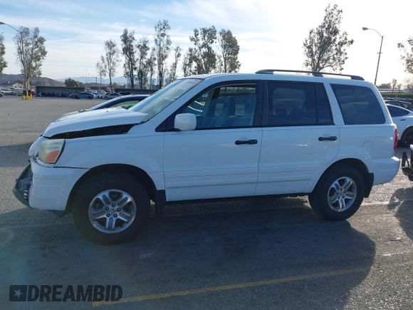 2005 Honda Pilot EX with VIN 5FNYF18475B060655, listed as a IAAI auction lot 41381619 with 142,680 mi miles and . Bid and sale history available at DreamBid. Image 14.
